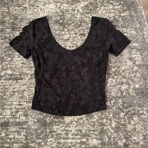 black snakeskin lulu top